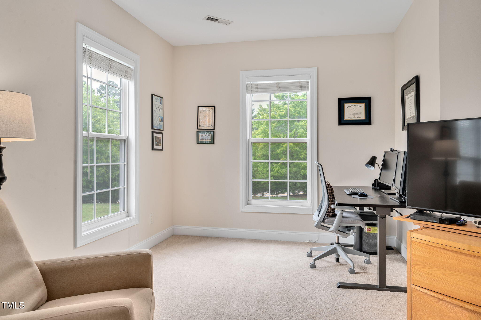 1106 Bellenden Drive Durham, NC 27713 - Photo 27 of 40 a livingroom with workspace and a window