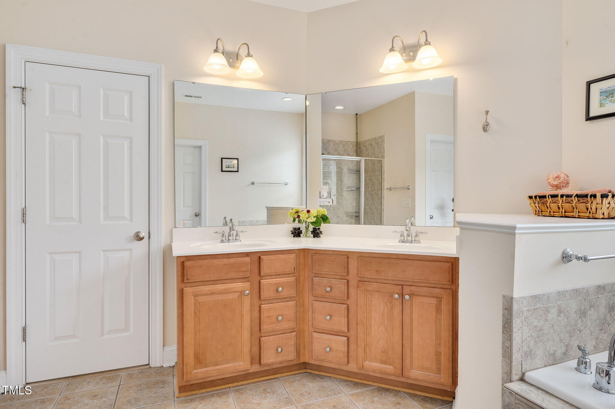 1106 Bellenden Drive Durham, NC 27713 - Photo 29 of 40 a spacious bathroom with a granite countertop sink and a mirror