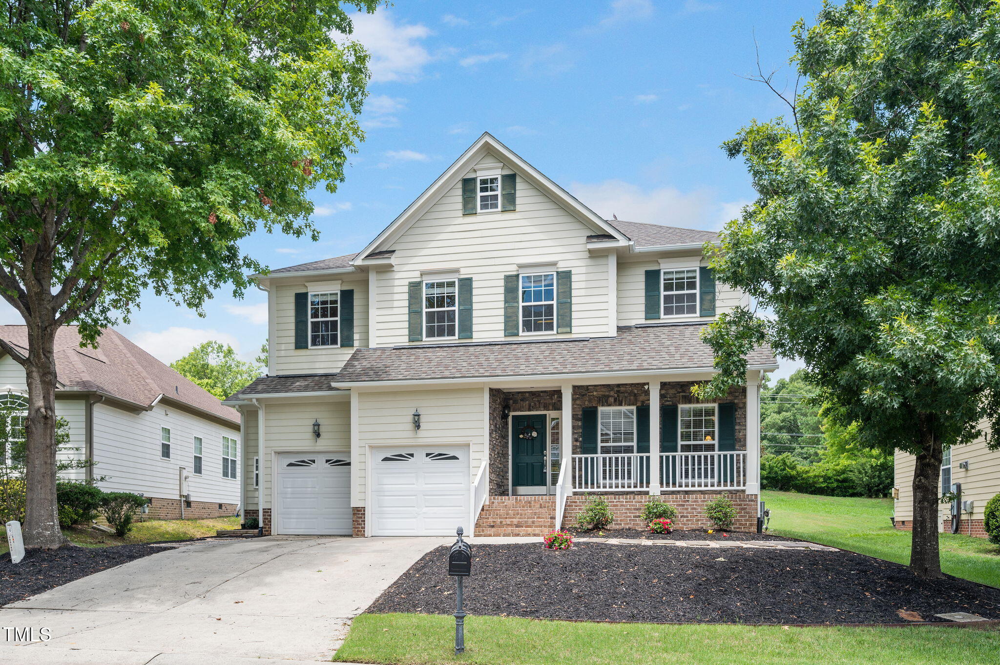 1106 Bellenden Drive Durham, NC 27713 - Photo 2 of 40 a front view of a house with a yard and porch