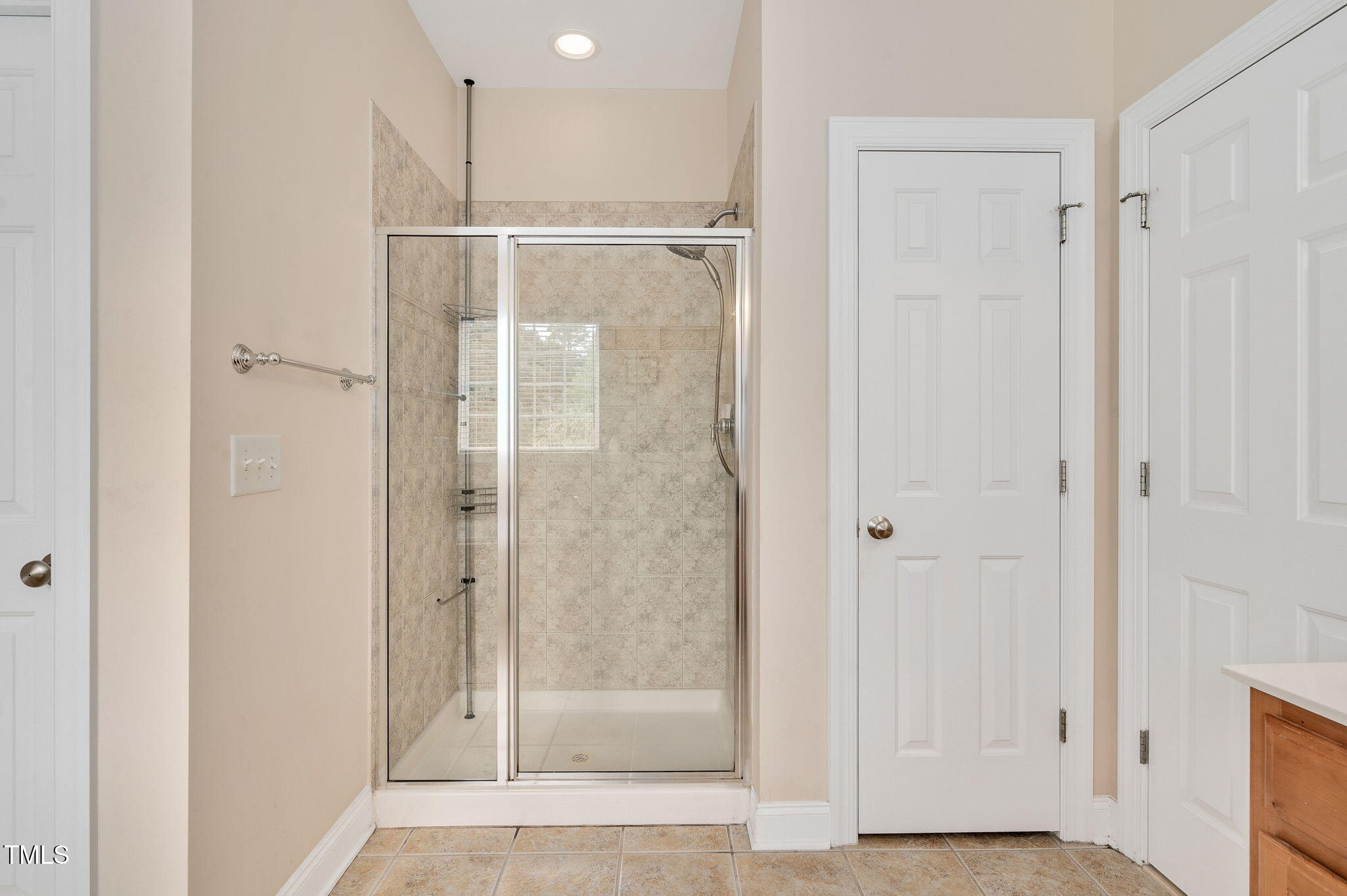 1106 Bellenden Drive Durham, NC 27713 - Photo 30 of 40 a bathroom with a glass shower door