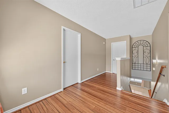 a view of entryway with wooden floor
