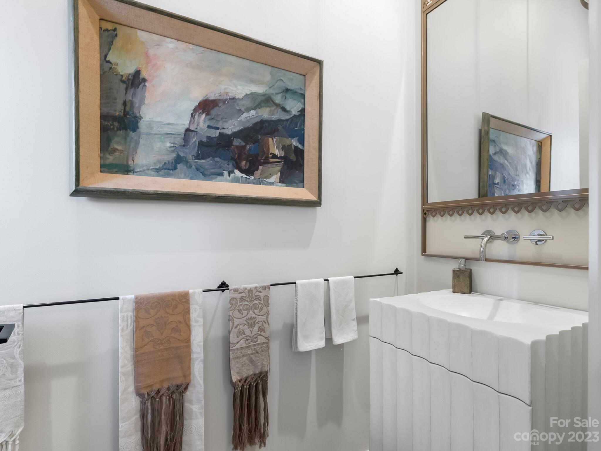 1200 Queens Road Charlotte, NC 28207 - Photo 18 of 42 a bathroom with a sink mirror and vanity