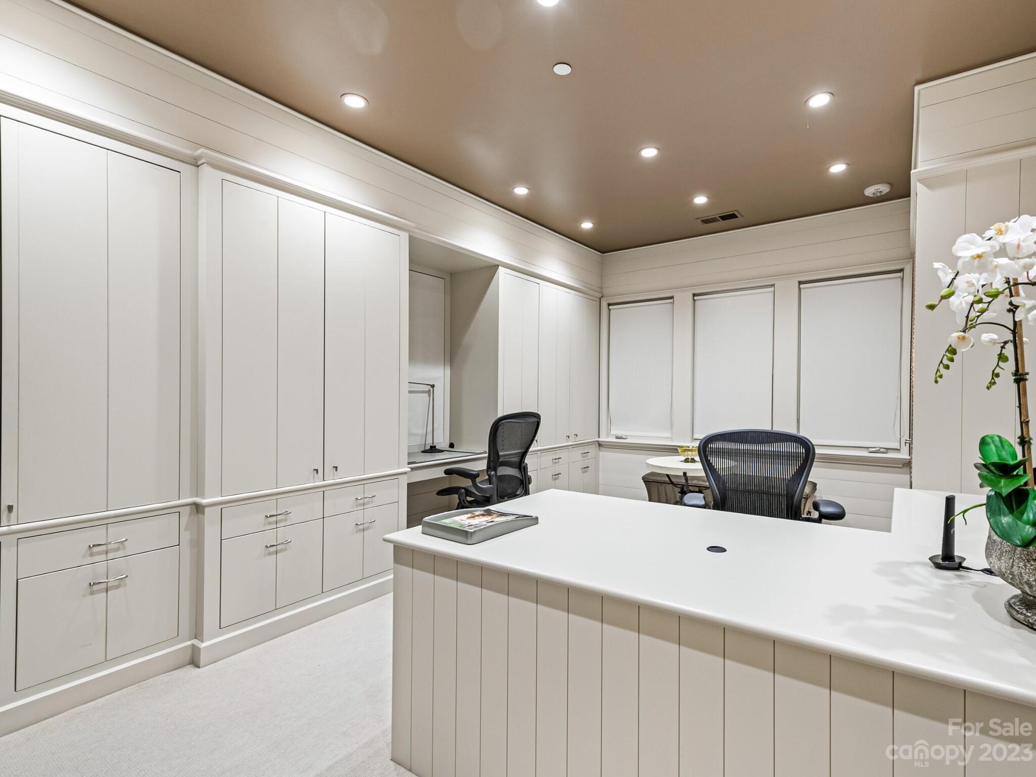 1200 Queens Road Charlotte, NC 28207 - Photo 28 of 42 a kitchen with sink and mirror