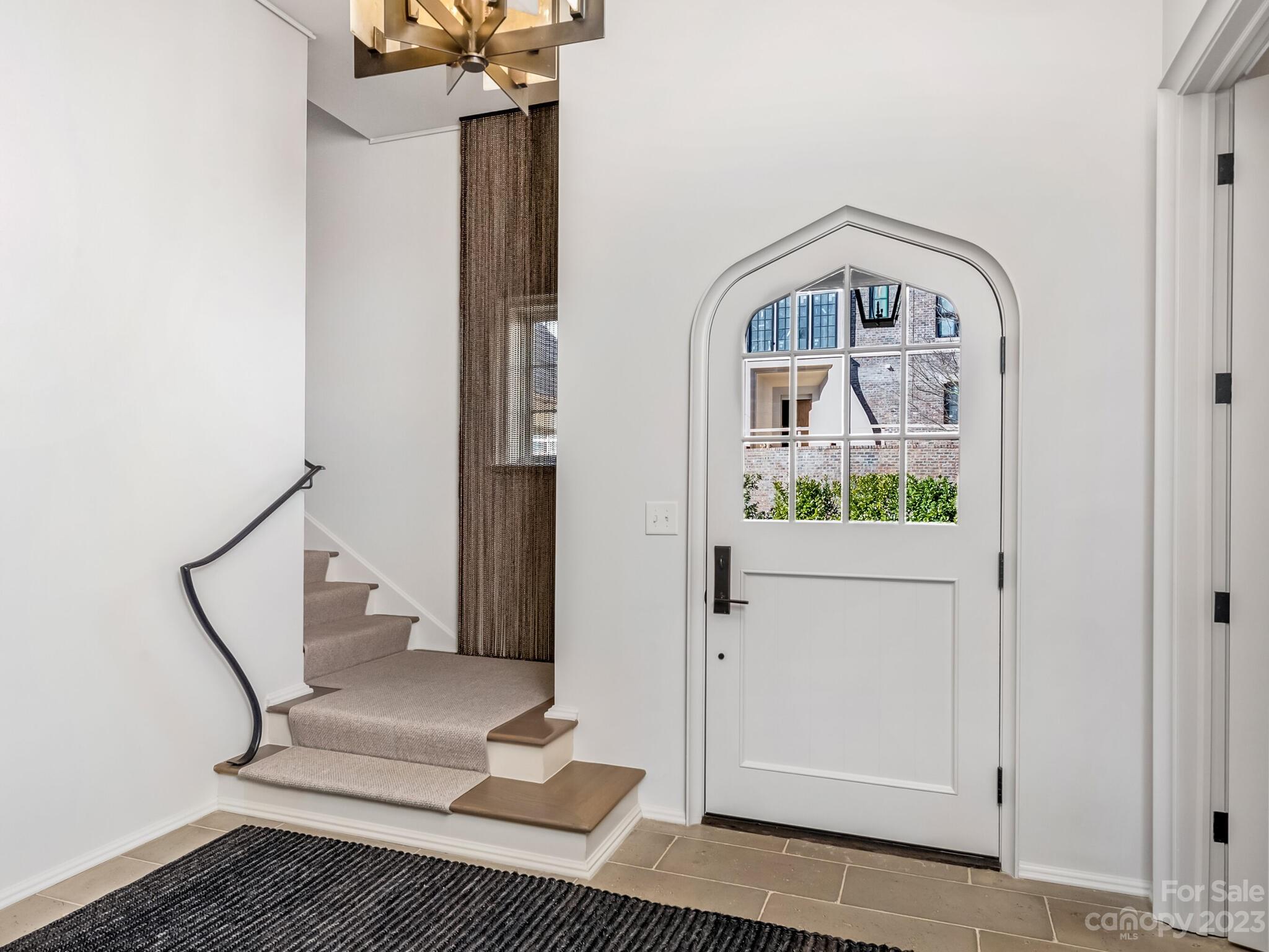 1200 Queens Road Charlotte, NC 28207 - Photo 4 of 42 a view of staircase with white walls