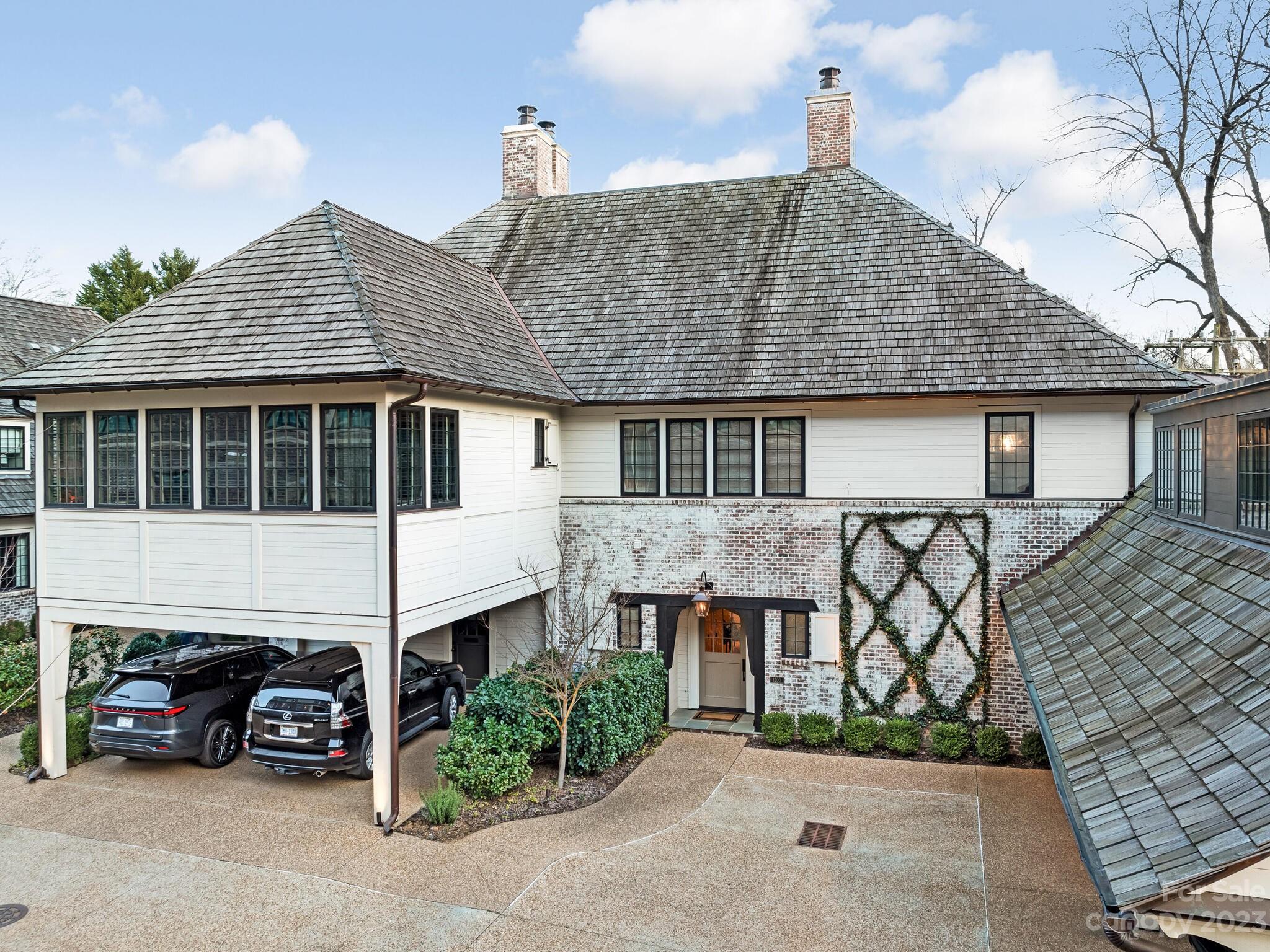 1200 Queens Road Charlotte, NC 28207 - Photo 42 of 42 a large house with a outdoor space
