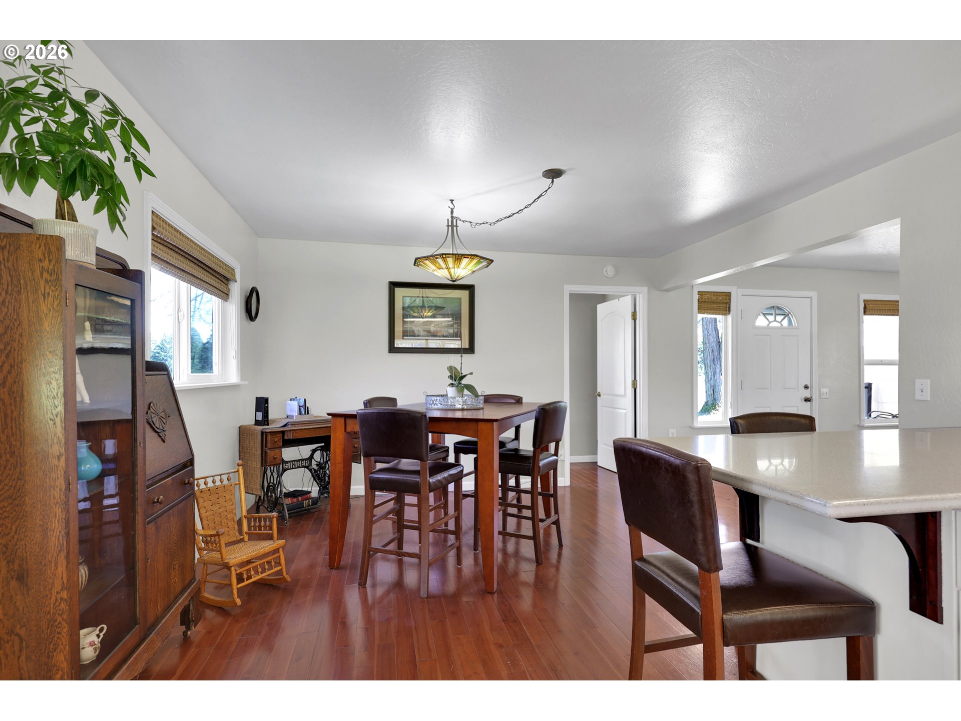 84816 Cloverdale Road Creswell, OR 97426 - Photo 11 of 48 a view of a dining room with furniture and chandelier