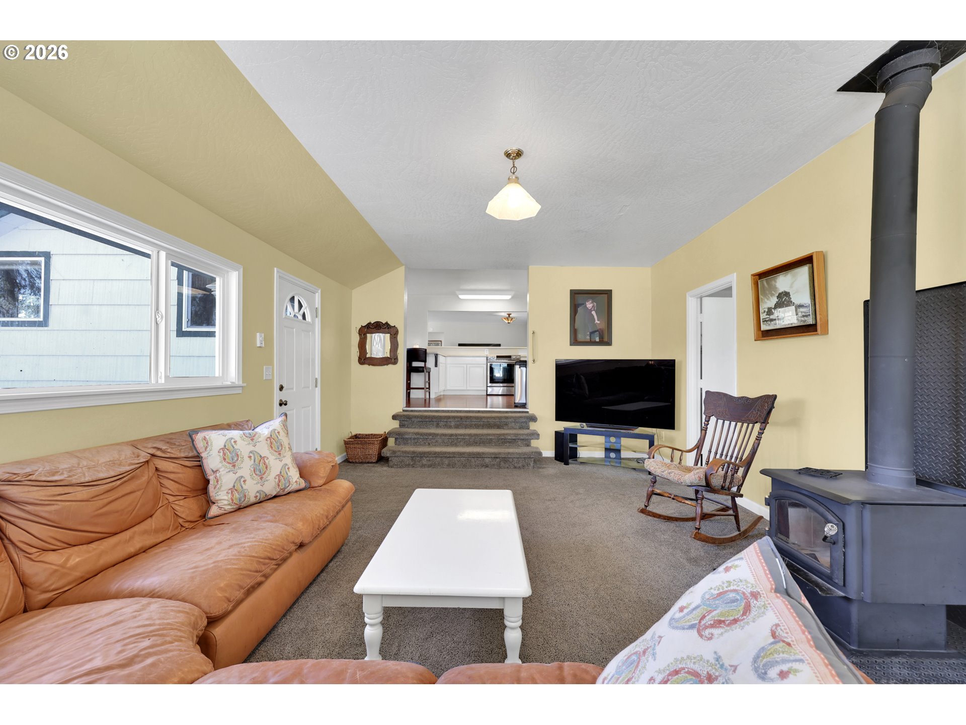 84816 Cloverdale Road Creswell, OR 97426 - Photo 15 of 48 a living room with furniture and a flat screen tv
