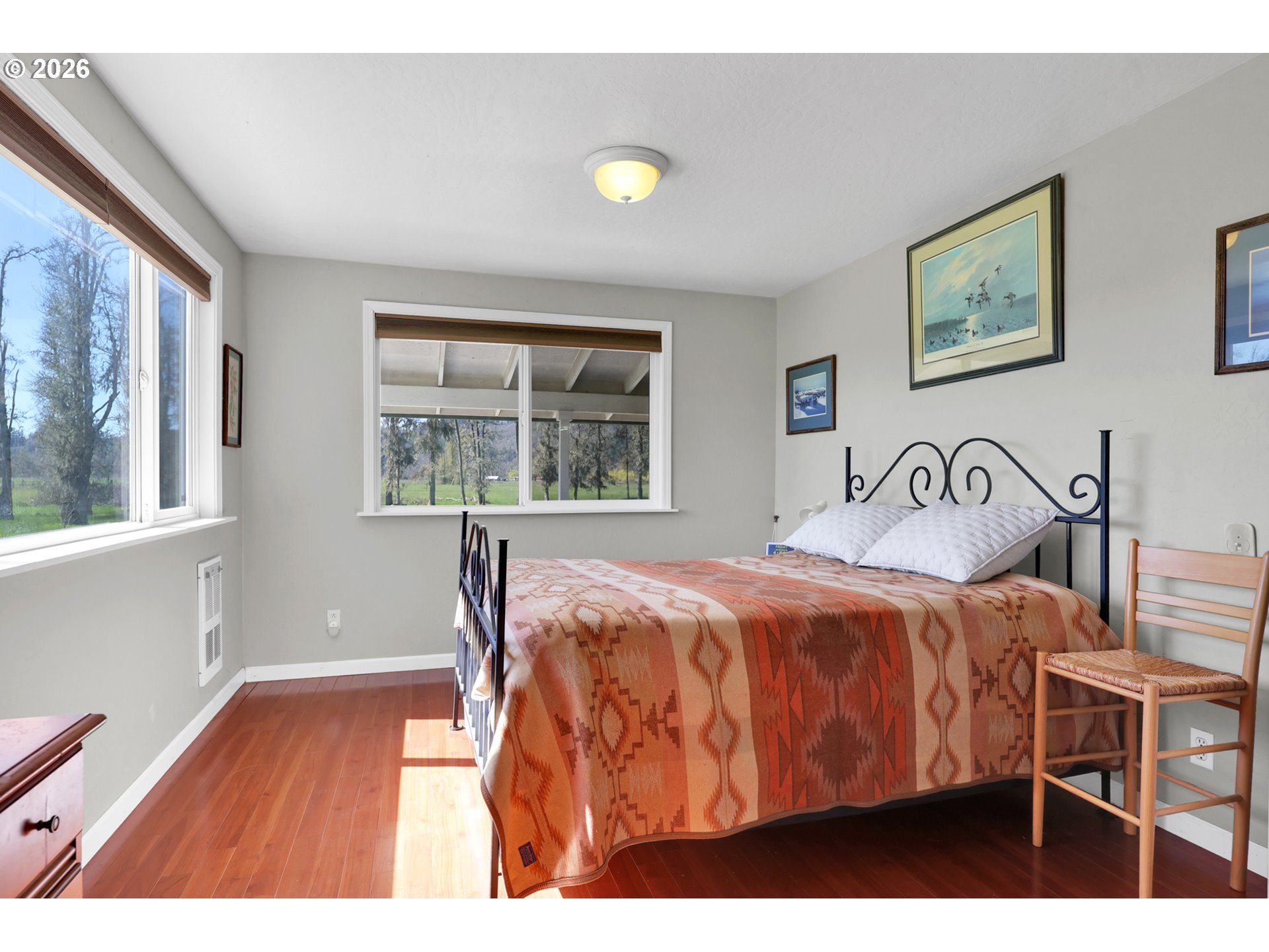 84816 Cloverdale Road Creswell, OR 97426 - Photo 25 of 48 a bedroom with a bed and a window