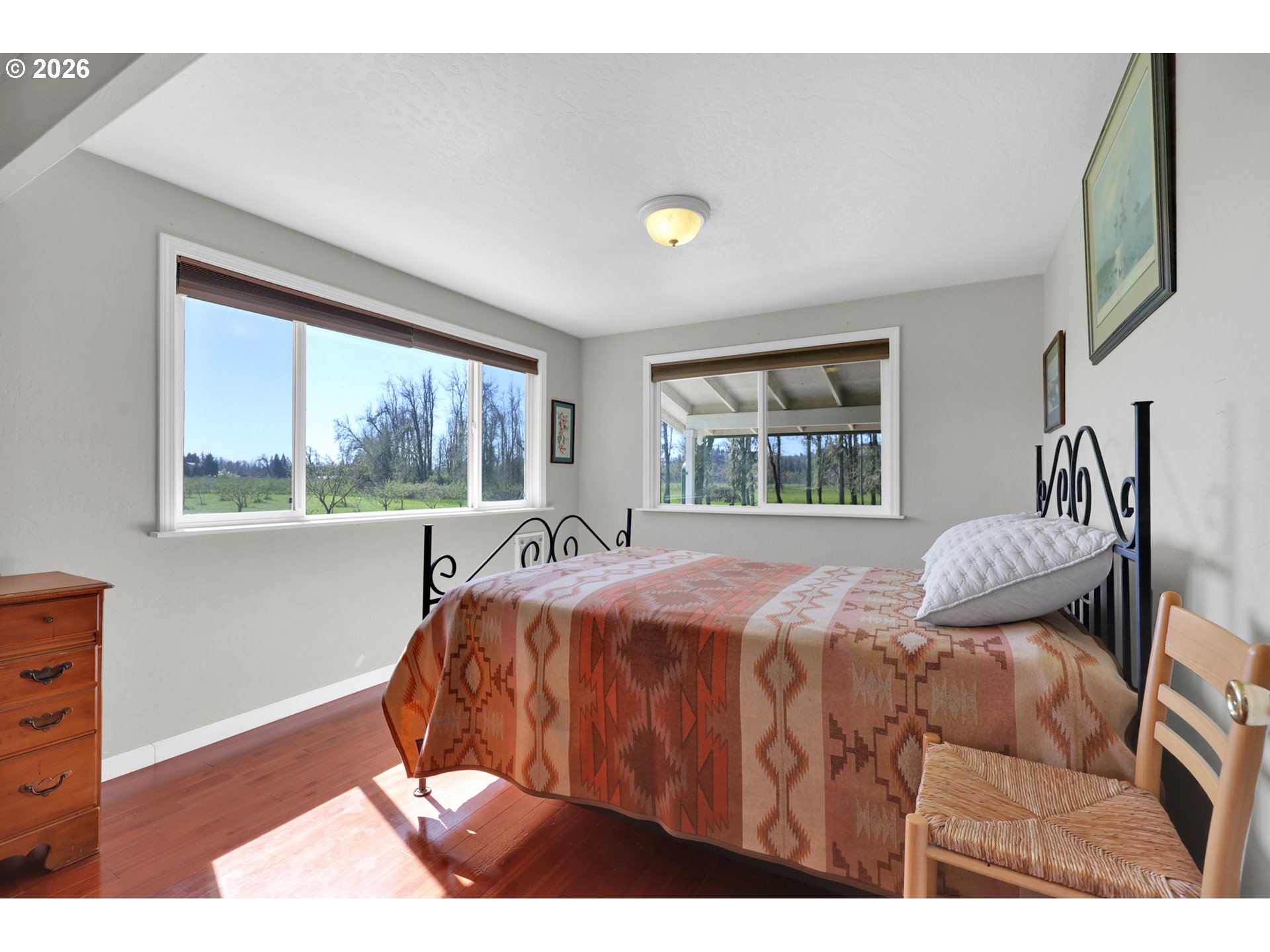 84816 Cloverdale Road Creswell, OR 97426 - Photo 26 of 48 a bedroom with a bed and a large window