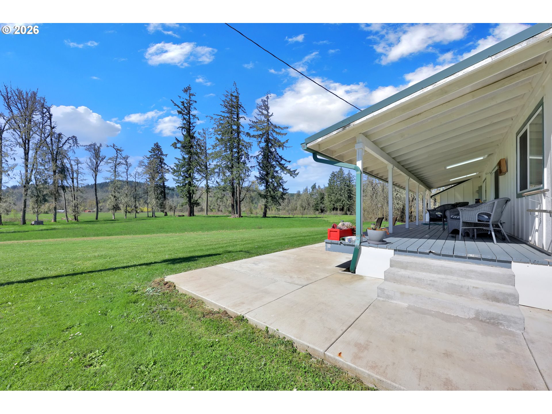 84816 Cloverdale Road Creswell, OR 97426 - Photo 27 of 48 a view of a park with swings and slides
