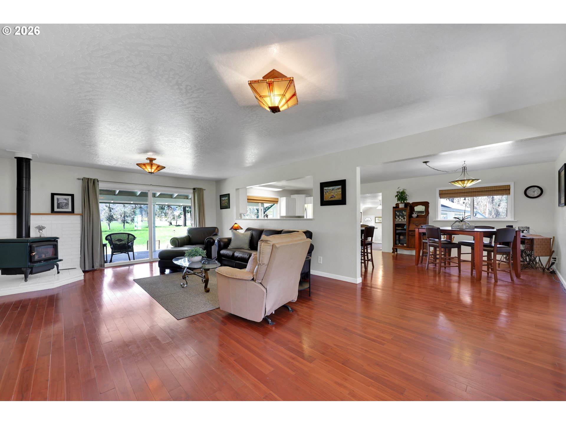 84816 Cloverdale Road Creswell, OR 97426 - Photo 7 of 48 a living room with furniture and a wooden floor