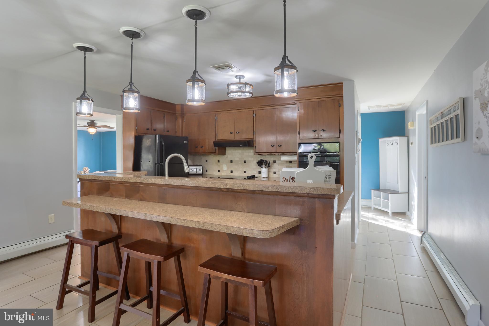 508 Noble Street Lebanon, PA 17042 - Photo 11 of 37 a view of a dining room and chairs in a kitchen