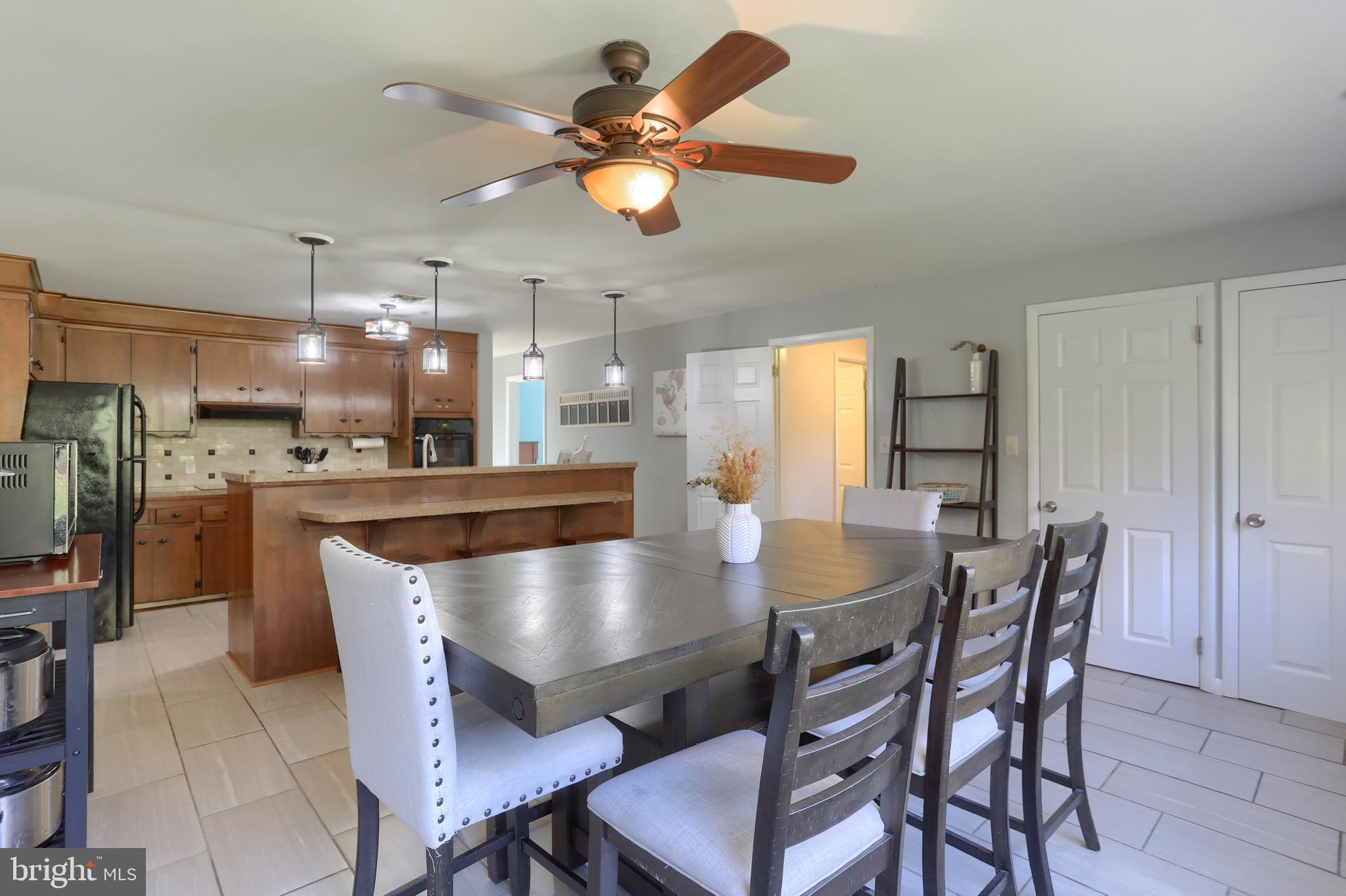 508 Noble Street Lebanon, PA 17042 - Photo 16 of 37 a view of a dining room with furniture and a chandelier