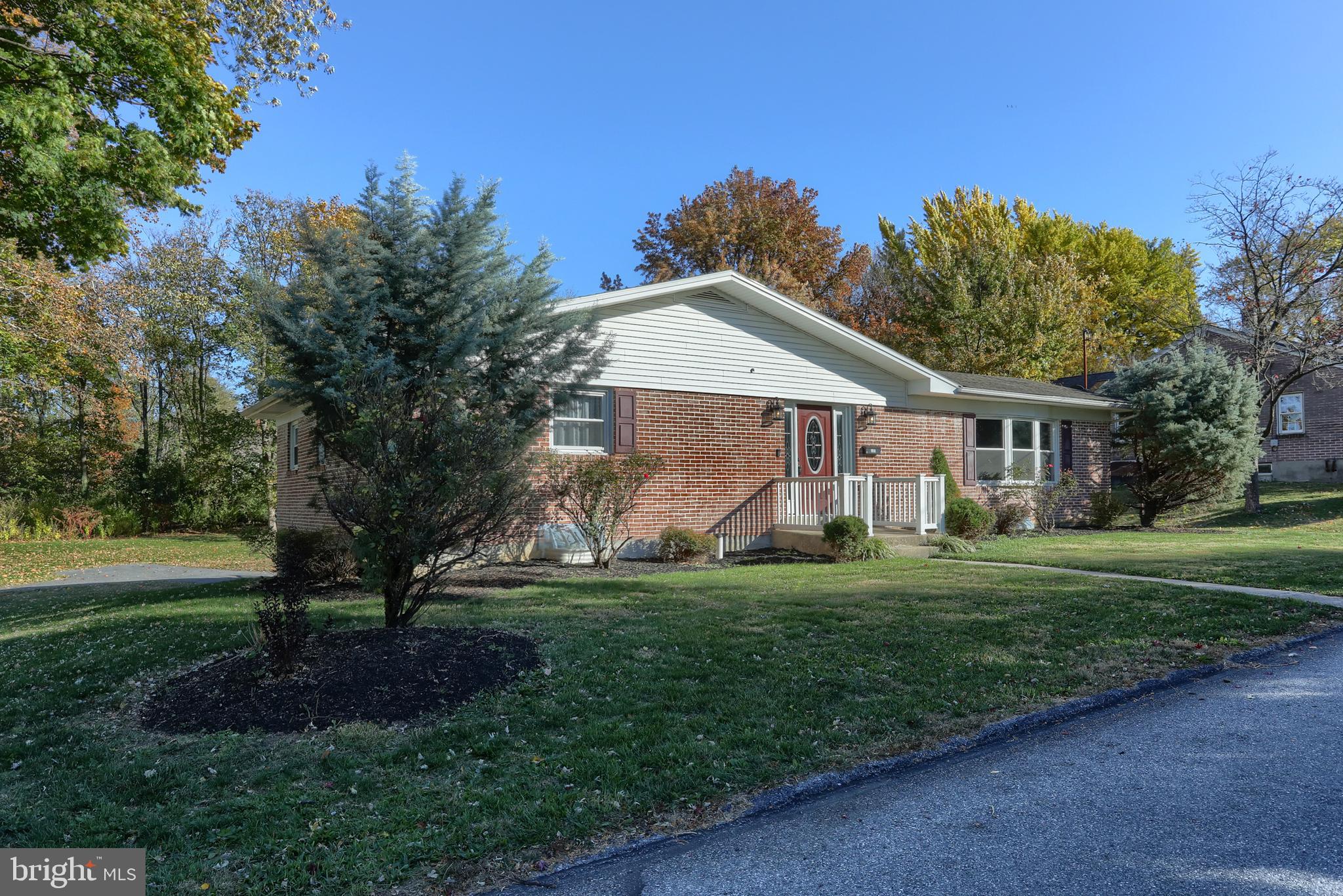 508 Noble Street Lebanon, PA 17042 - Photo 2 of 37 a front view of a house with a garden