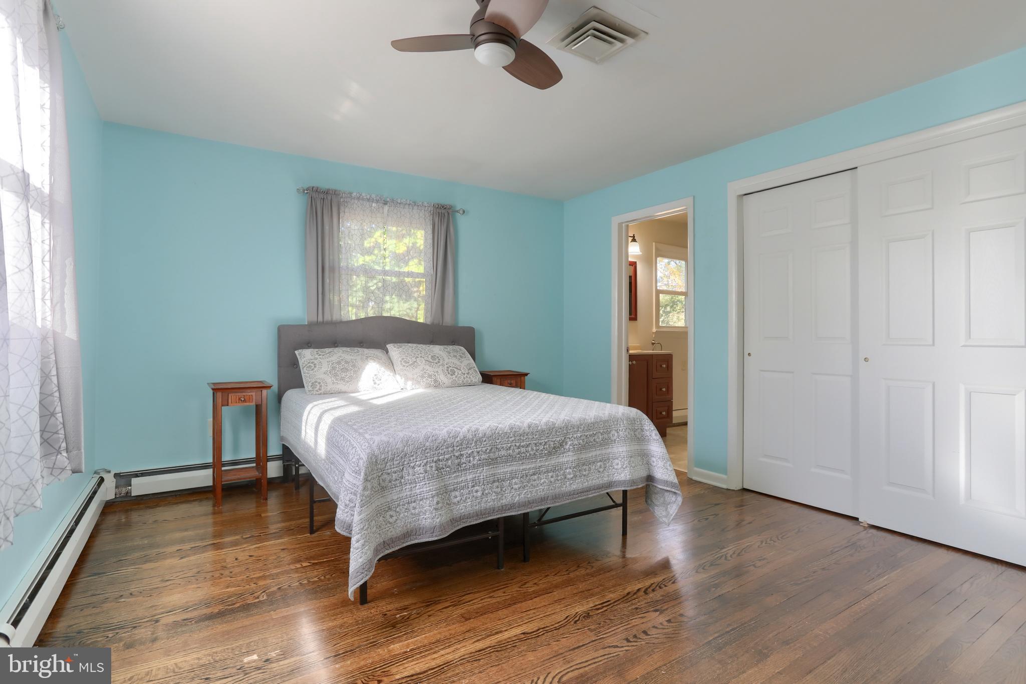 508 Noble Street Lebanon, PA 17042 - Photo 22 of 37 a bedroom with a bed and wooden floor