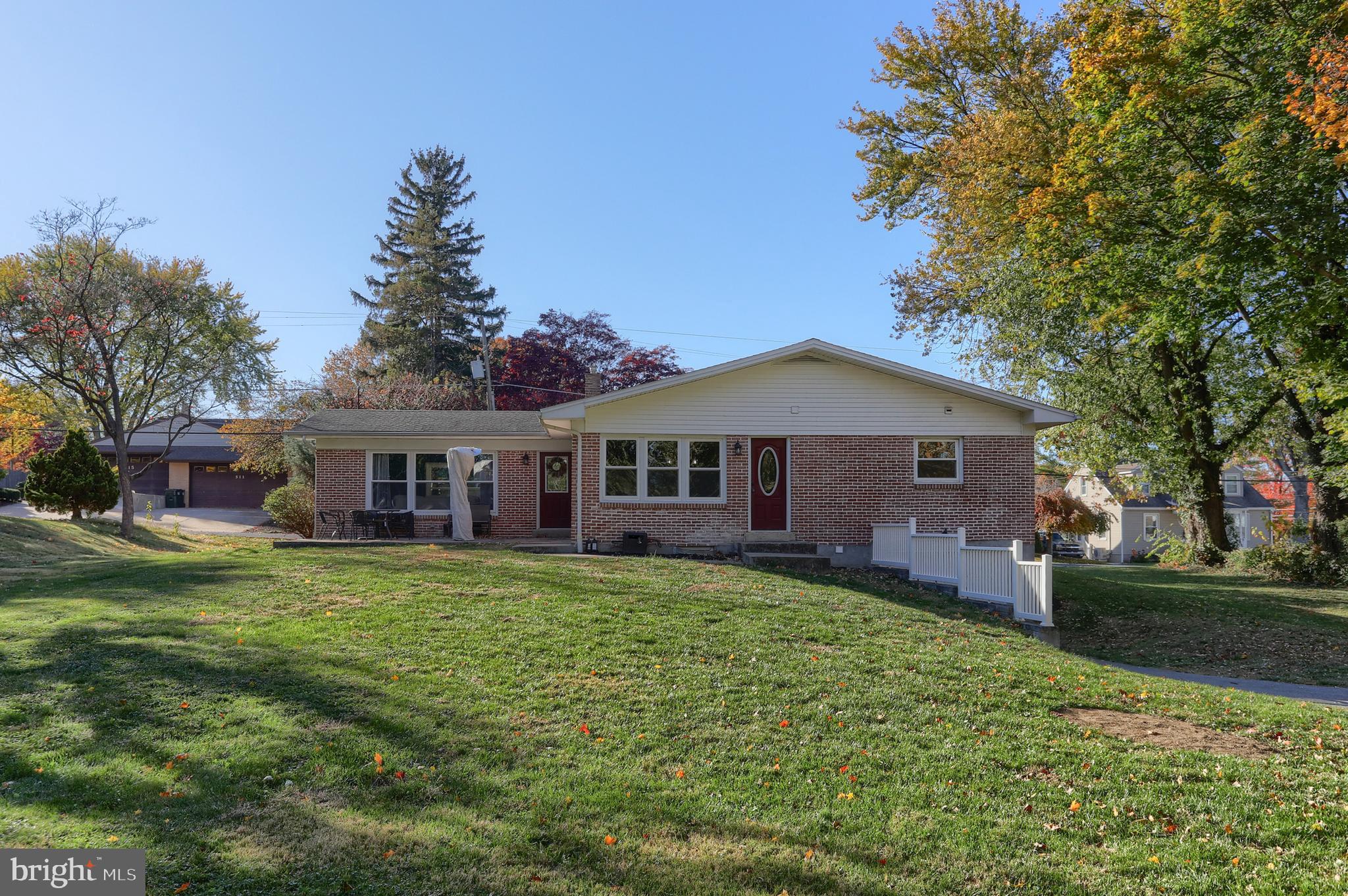508 Noble Street Lebanon, PA 17042 - Photo 34 of 37 a front view of a house with a garden