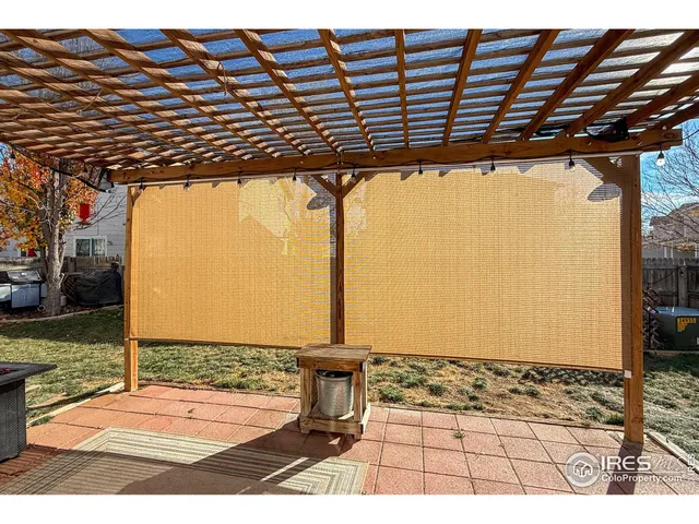 a view of a terrace with furniture