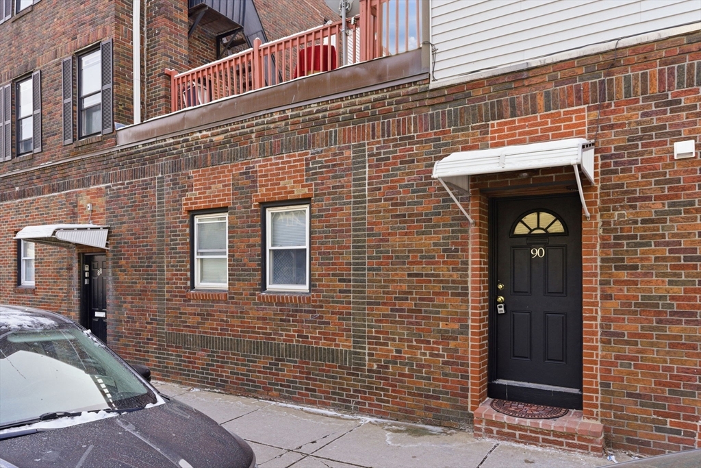 90 Brooks Street, Unit 90 Boston, MA 02128 - Photo 9 of 9 a view of brick building with a door