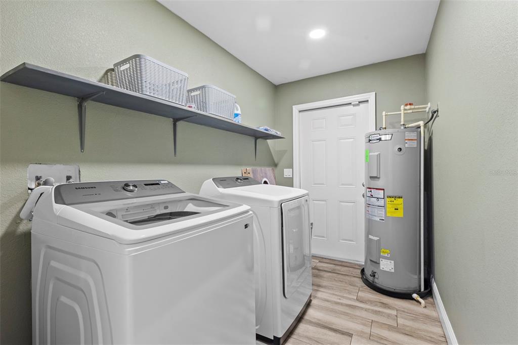 3708 North 56th Street Tampa, FL 33619 - Photo 22 of 22 a utility room with dryer and washer