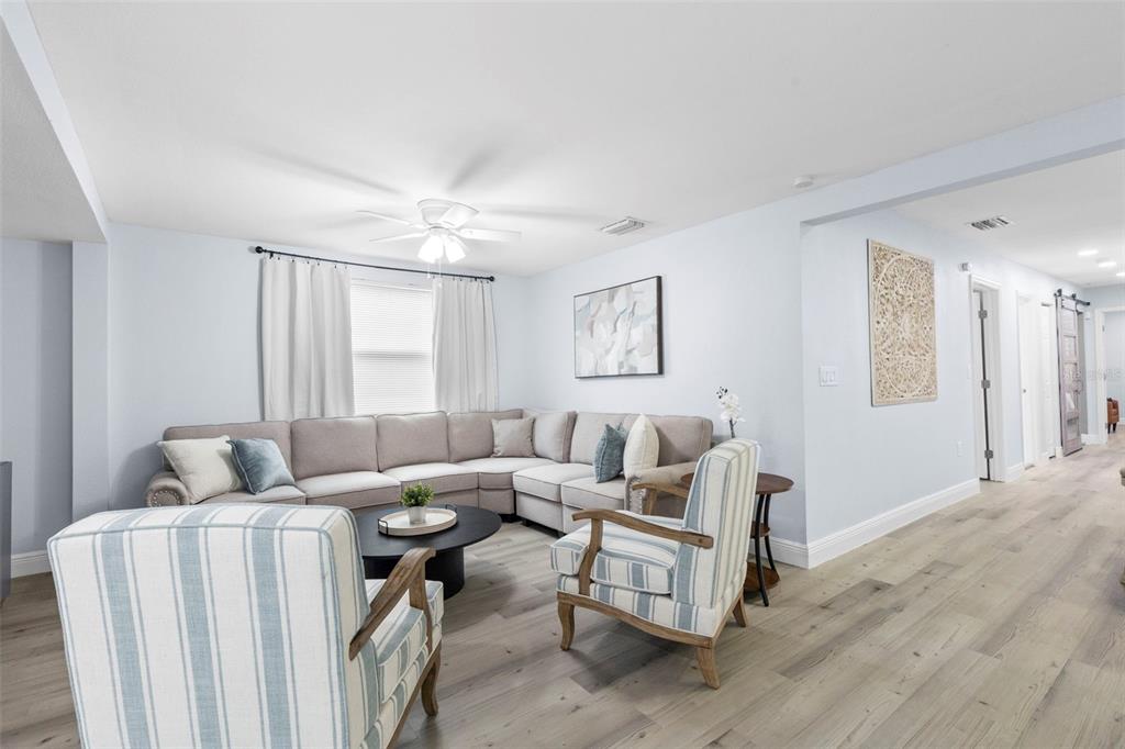 3708 North 56th Street Tampa, FL 33619 - Photo 6 of 22 a living room with furniture and a large window