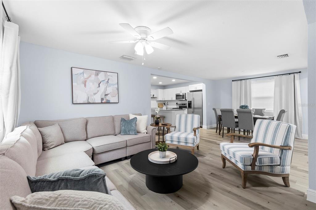 3708 North 56th Street Tampa, FL 33619 - Photo 8 of 22 a living room with furniture and a table