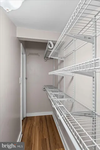 a view of a balcony with wooden floor