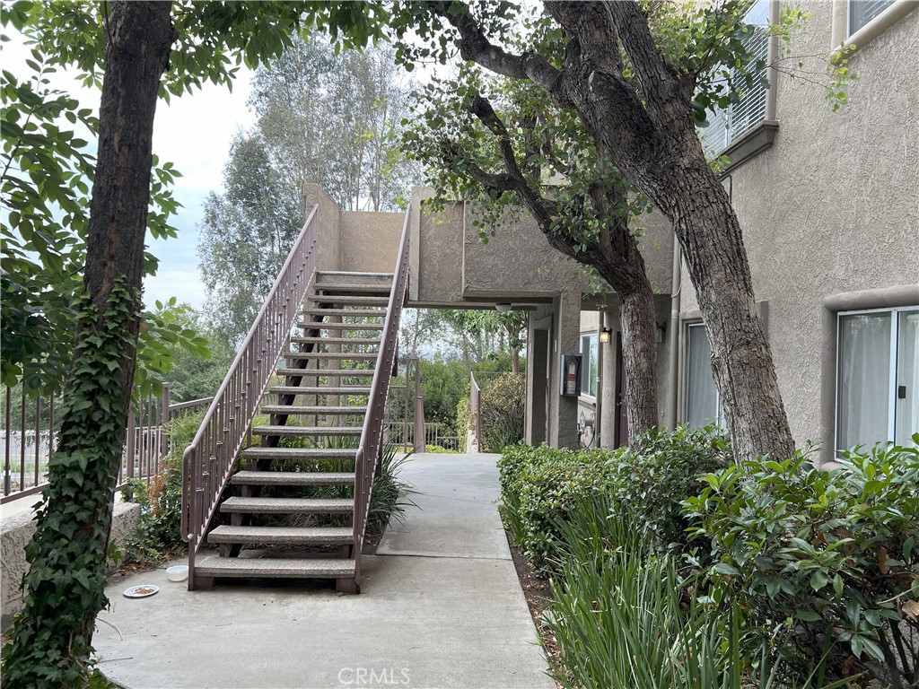800 Grand Avenue, Unit C4 Diamond Bar, CA 91765 - Photo 1 of 19 a front view of a house with a yard