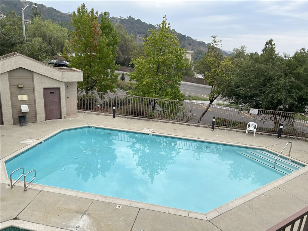 800 Grand Avenue, Unit C4 Diamond Bar, CA 91765 - Photo 15 of 19 a view of a swimming pool with a patio