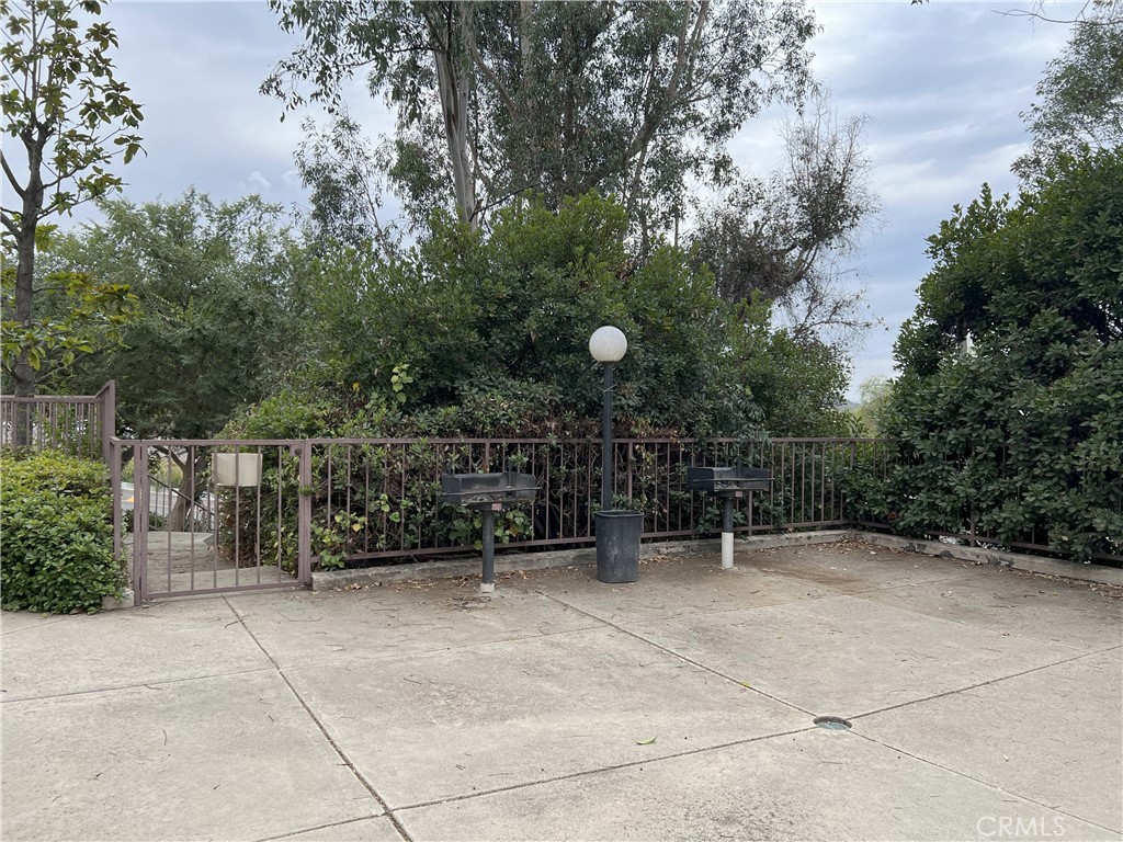 800 Grand Avenue, Unit C4 Diamond Bar, CA 91765 - Photo 16 of 19 a view of backyard with seating space and trees