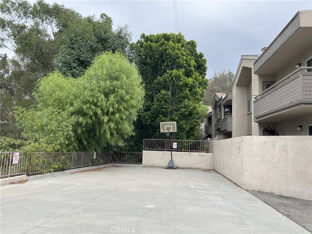 800 Grand Avenue, Unit C4 Diamond Bar, CA 91765 - Photo 17 of 19 a front view of a house with a tree