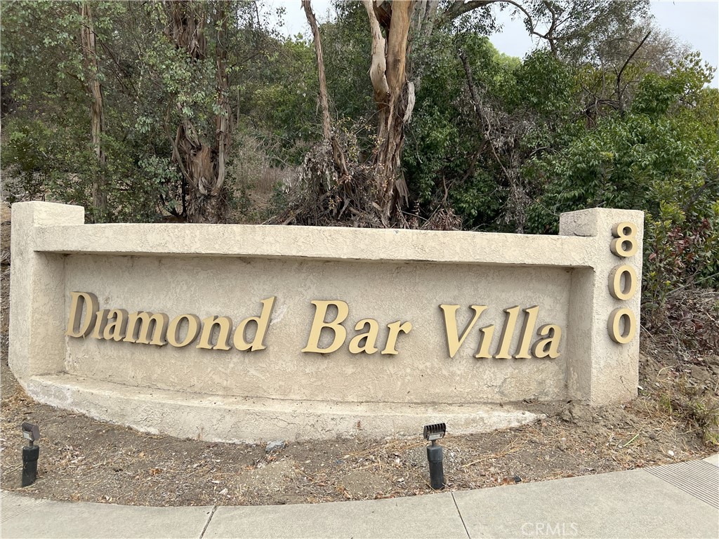 800 Grand Avenue, Unit C4 Diamond Bar, CA 91765 - Photo 18 of 19 a view of outdoor space with signage and flags