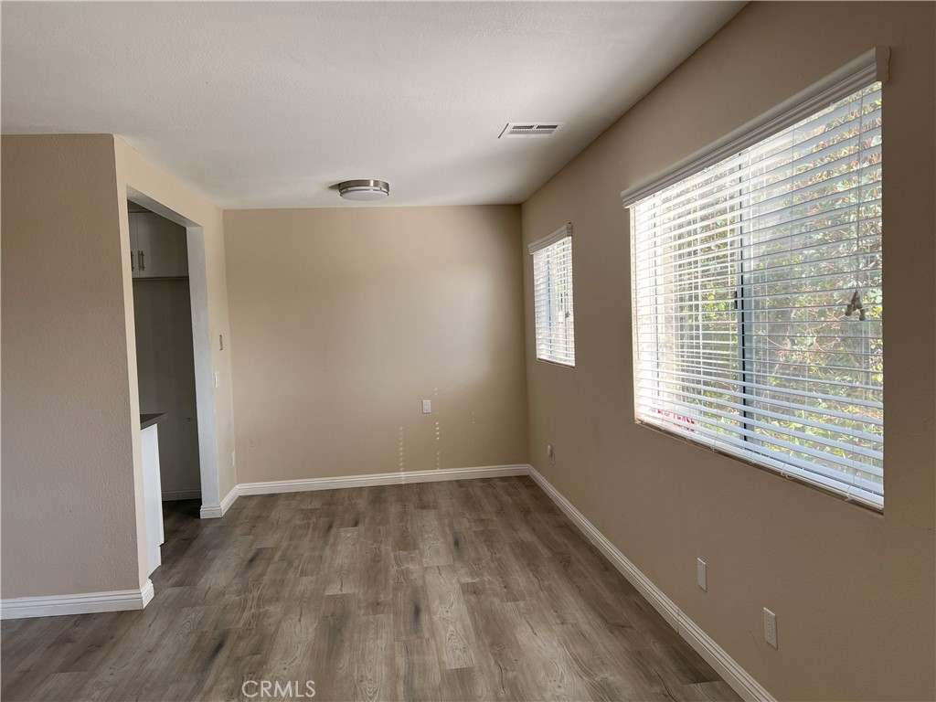 800 Grand Avenue, Unit C4 Diamond Bar, CA 91765 - Photo 5 of 19 a view of a room with wooden floor and windows