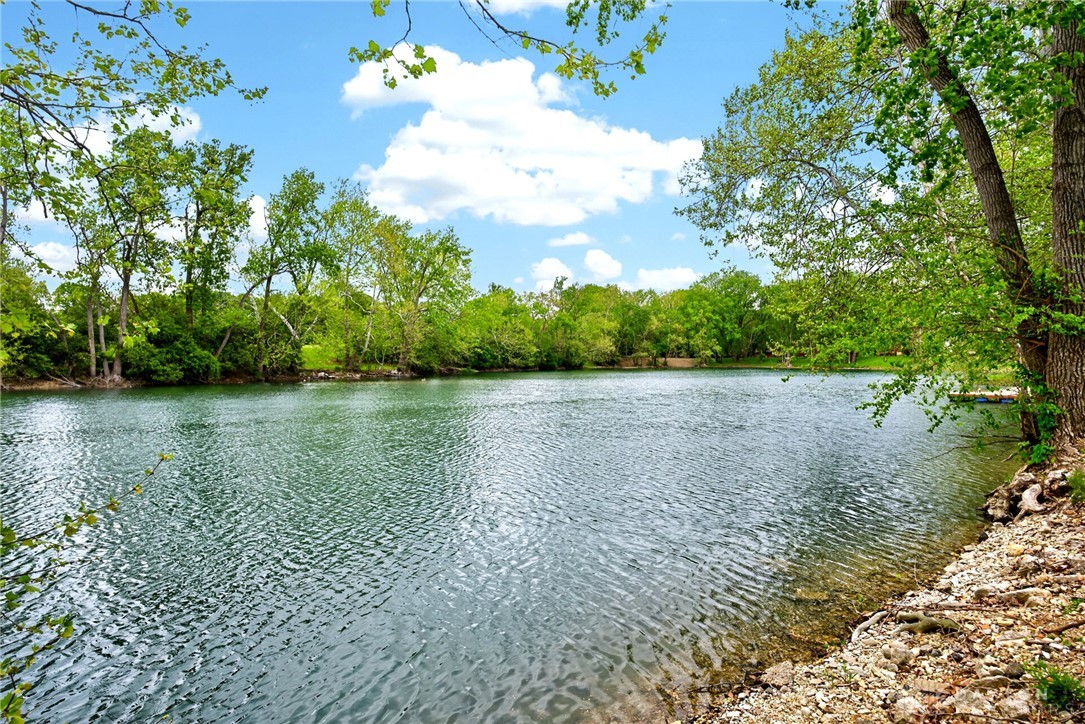 3889 Powell Road Huber Heights, OH 45424 - Photo 15 of 18 This tranquil waterfront property offers picturesque views and direct access to serene waters.