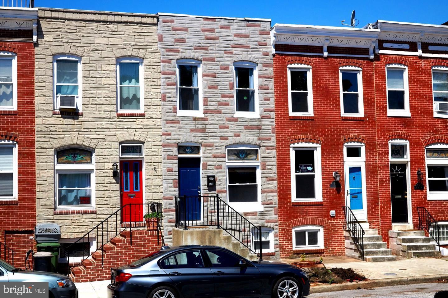 518 South Luzerne Avenue Baltimore, MD 21224 - Photo 1 of 21 Charming row homes with vibrant doors.