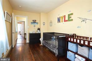 518 South Luzerne Avenue Baltimore, MD 21224 - Photo 11 of 21 Charming nursery with playful decor accents.
