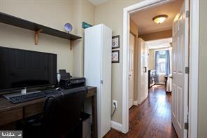 518 South Luzerne Avenue Baltimore, MD 21224 - Photo 12 of 21 Cozy hallway with a functional workspace.