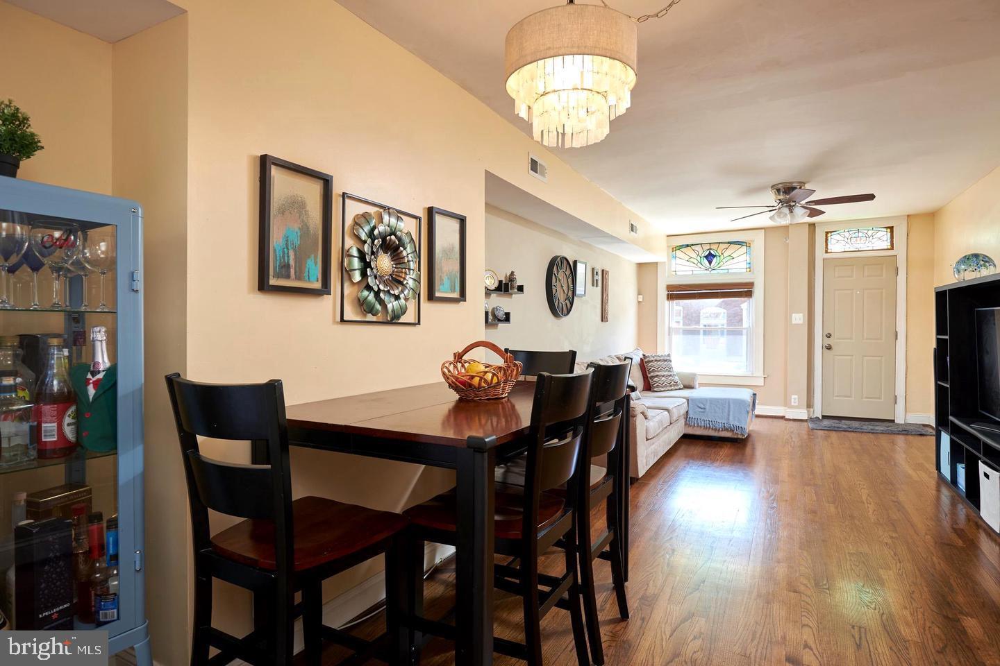 518 South Luzerne Avenue Baltimore, MD 21224 - Photo 5 of 21 Inviting open space with warm wood tones.
