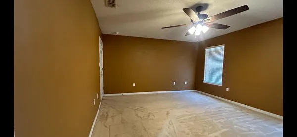 a view of empty room with window