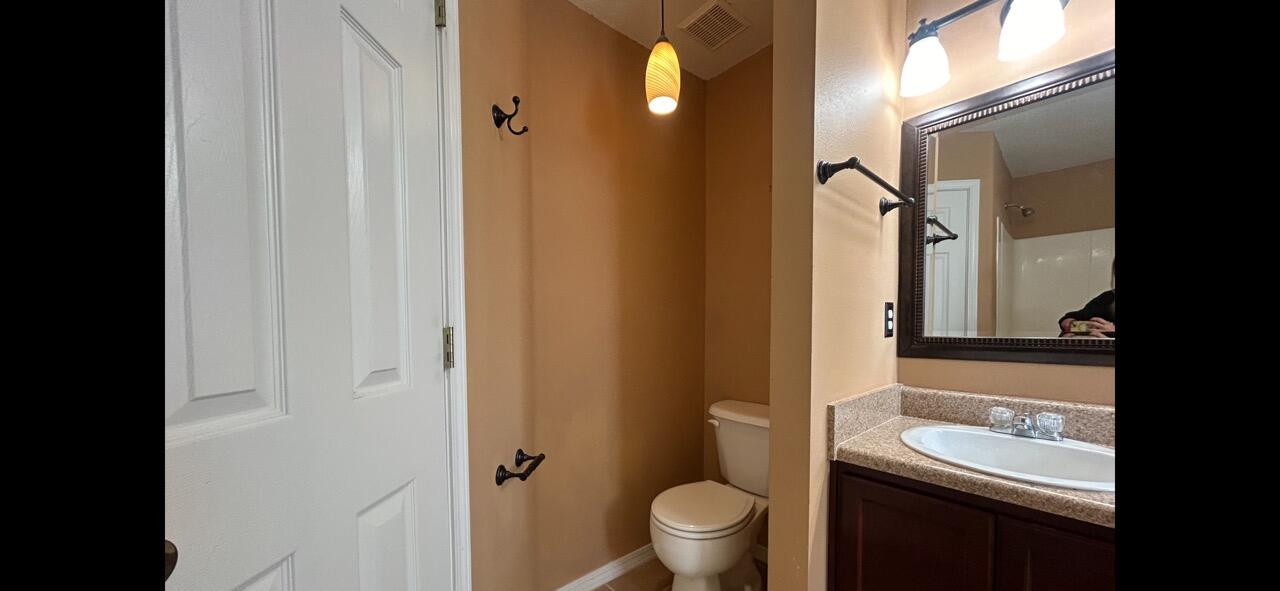 267 Limestone Circle Crestview, FL 32539 - Photo 17 of 21 a bathroom with a sink toilet and shower