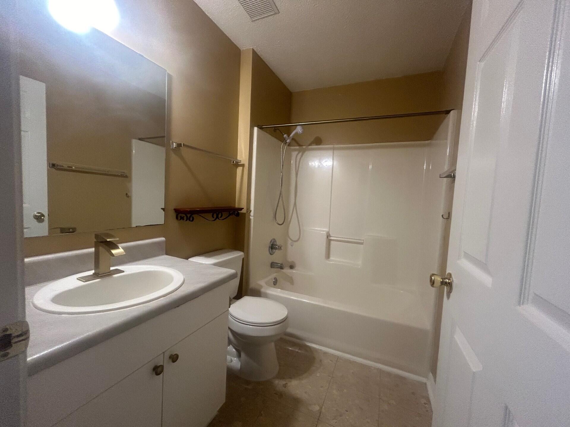267 Limestone Circle Crestview, FL 32539 - Photo 21 of 21 a bathroom with a sink toilet and shower