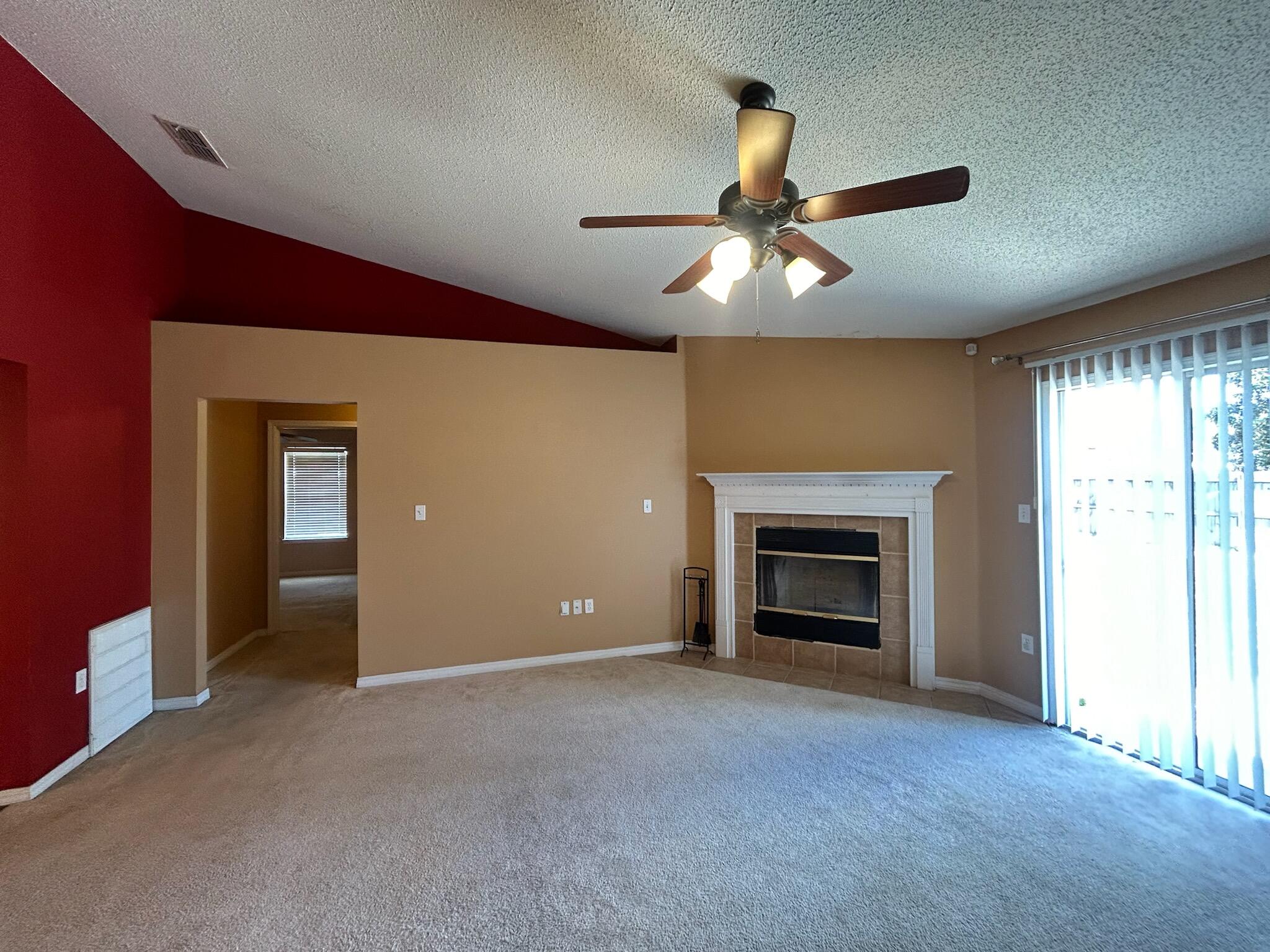 267 Limestone Circle Crestview, FL 32539 - Photo 3 of 21 a view of an empty room with window and fireplace
