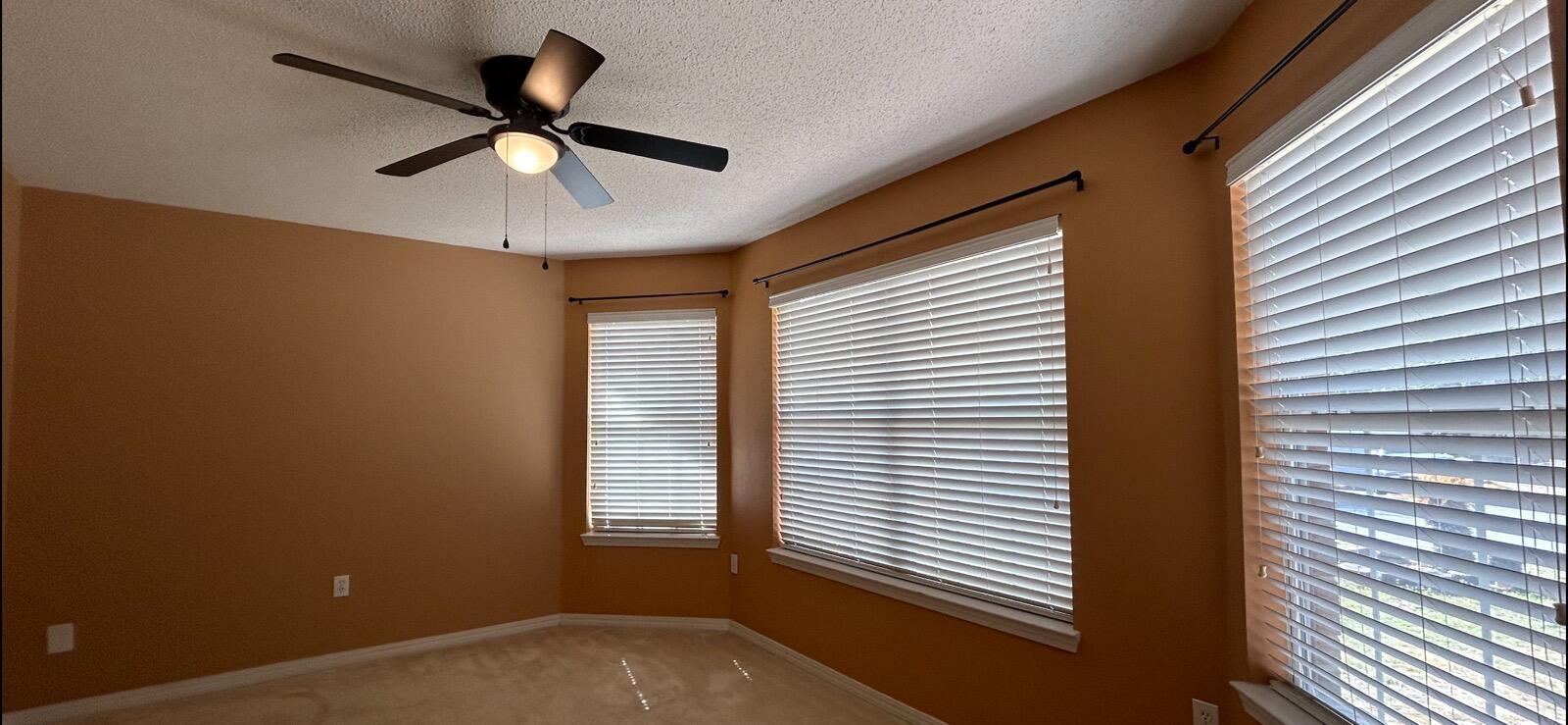 267 Limestone Circle Crestview, FL 32539 - Photo 7 of 21 a view of a livingroom with a ceiling fan and window