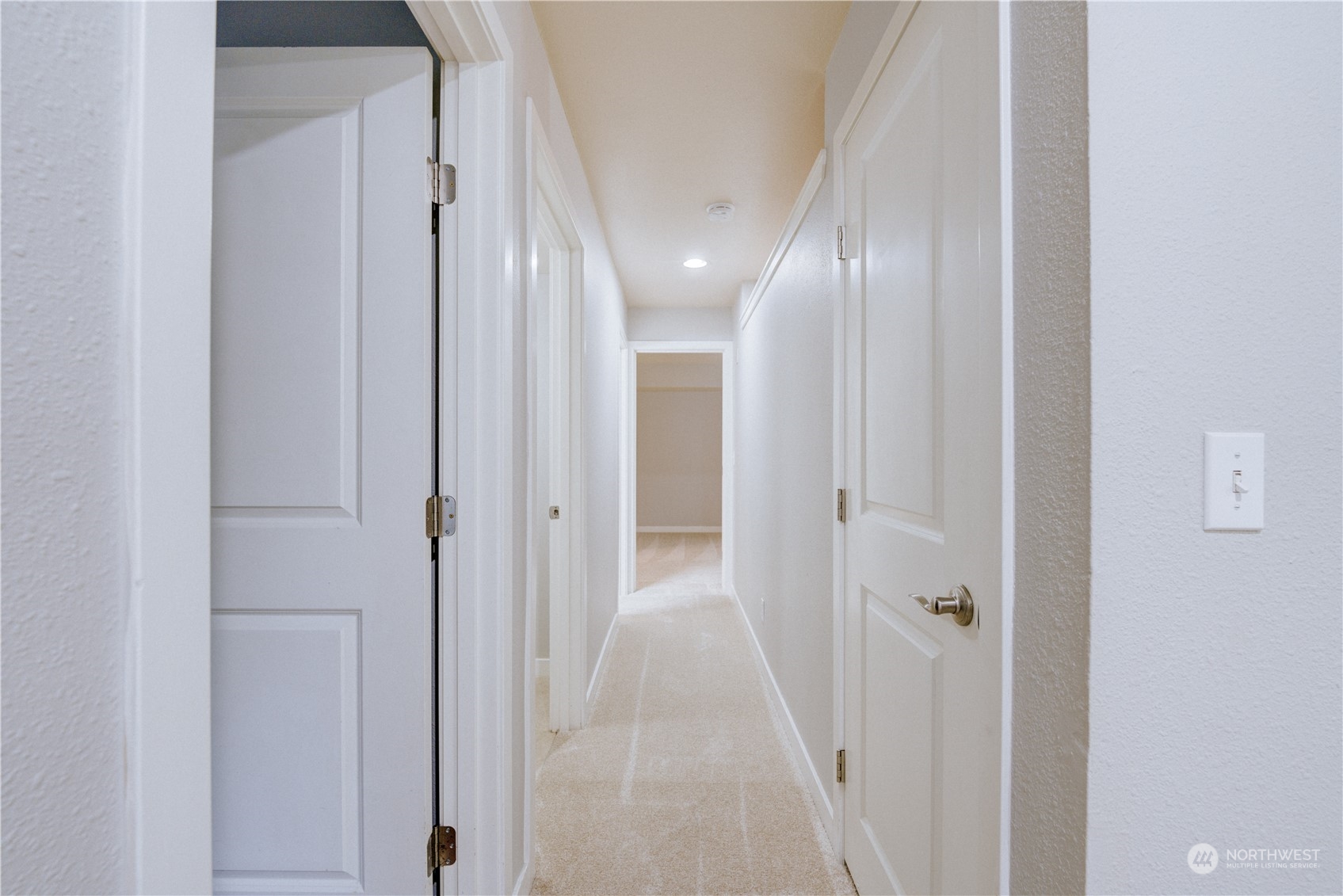 3908 243rd Place Southeast, Unit Q202 Bothell, WA 98021 - Photo 18 of 40 a view of a hallway