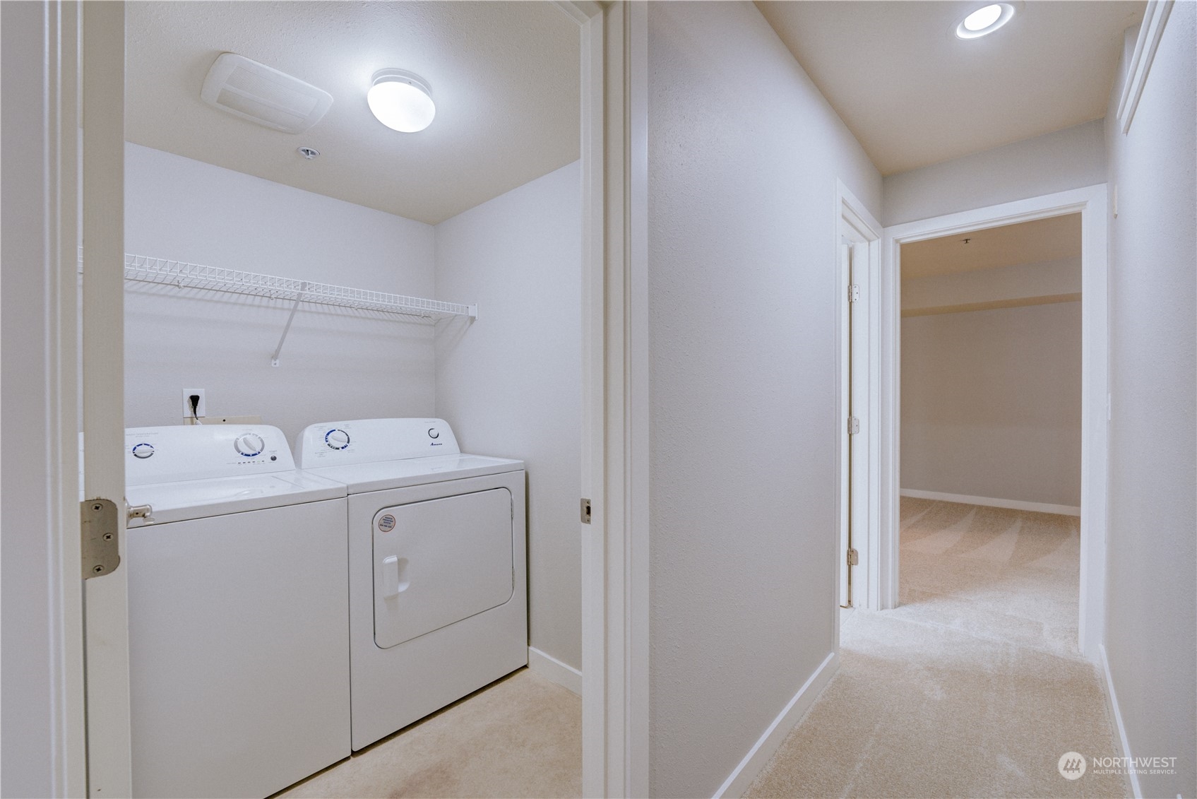 3908 243rd Place Southeast, Unit Q202 Bothell, WA 98021 - Photo 22 of 40 a utility room with dryer and washer
