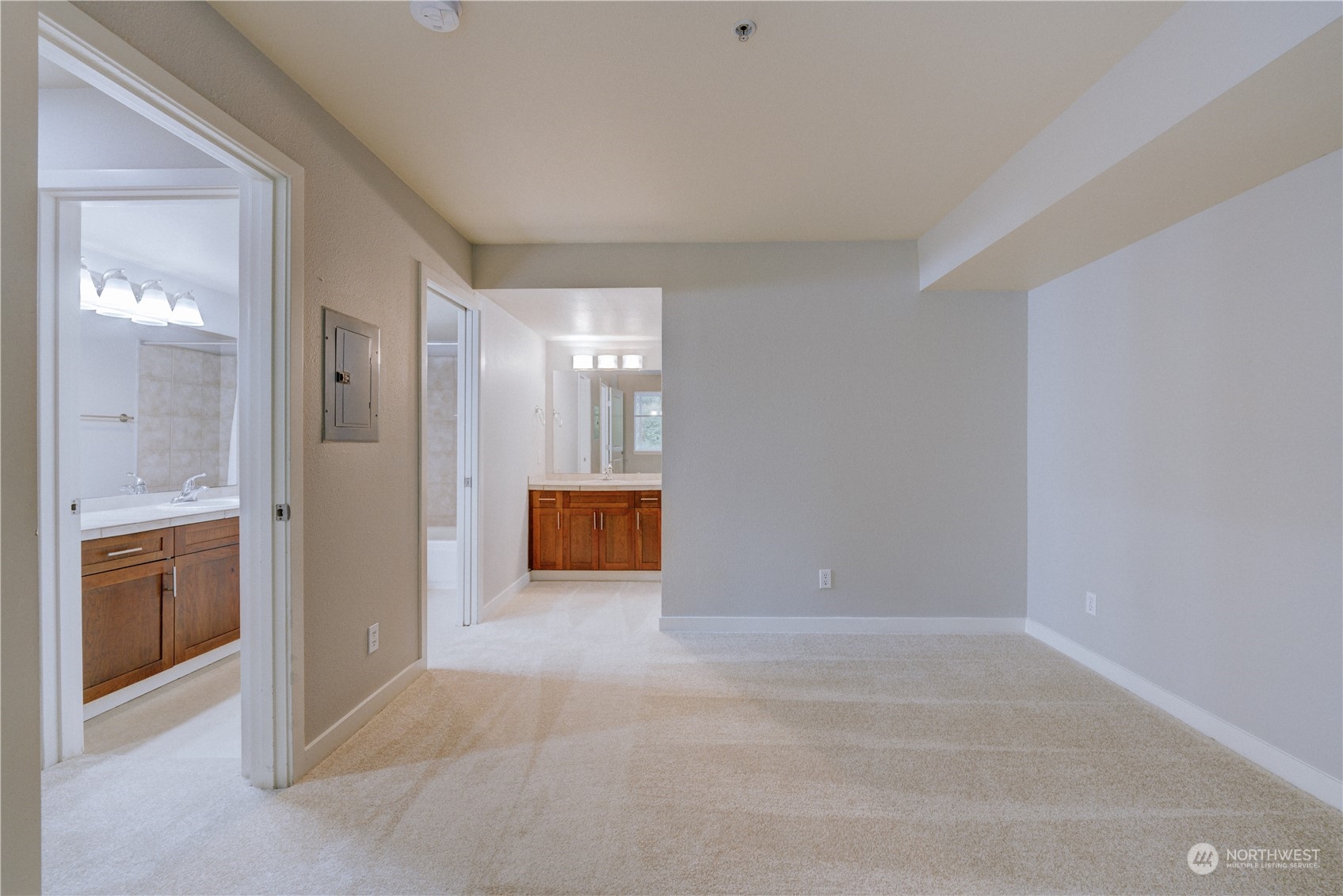 3908 243rd Place Southeast, Unit Q202 Bothell, WA 98021 - Photo 28 of 40 a view of a bathroom with a shower and a sink