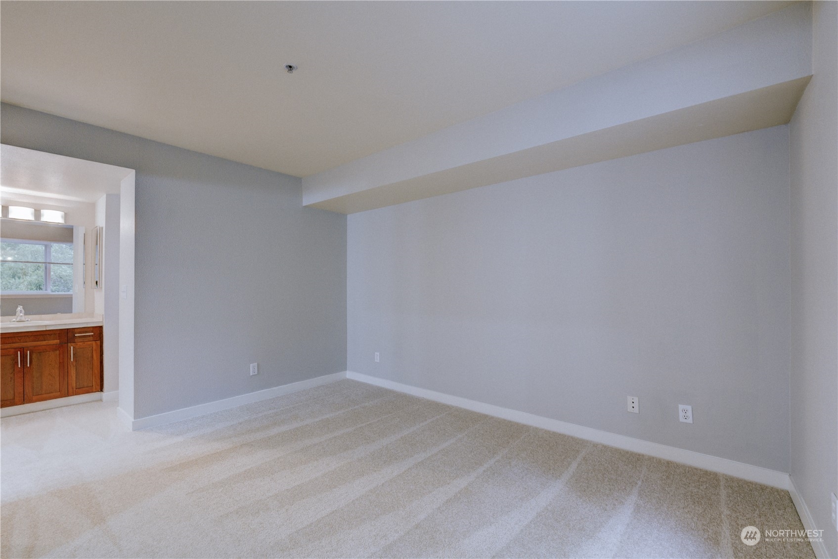 3908 243rd Place Southeast, Unit Q202 Bothell, WA 98021 - Photo 31 of 40 a view of an empty room with window