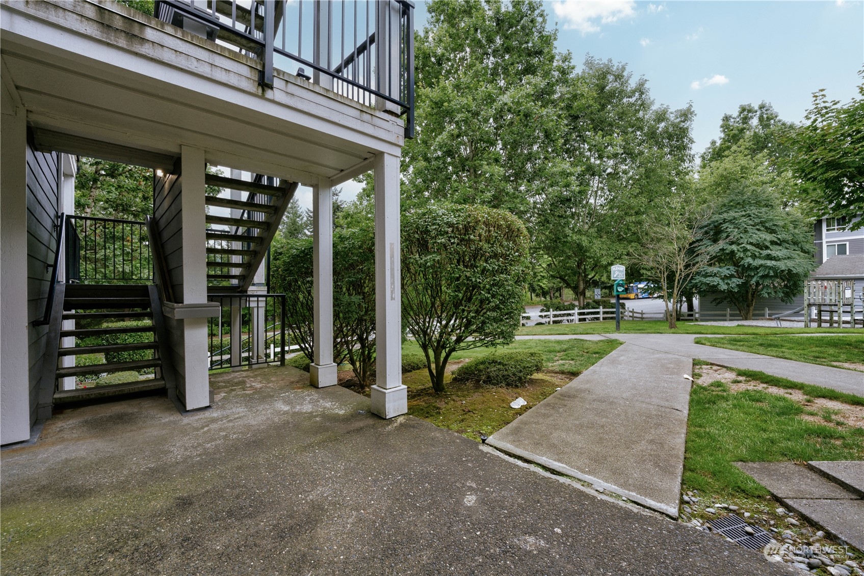 3908 243rd Place Southeast, Unit Q202 Bothell, WA 98021 - Photo 34 of 40 a view of a porch with garden
