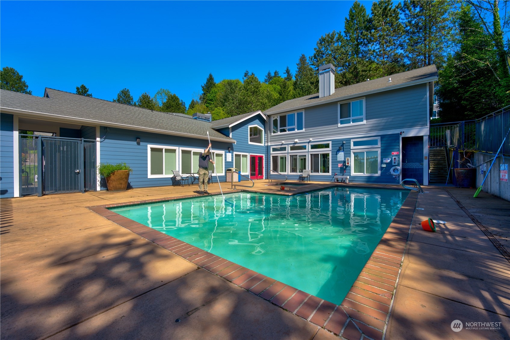 3908 243rd Place Southeast, Unit Q202 Bothell, WA 98021 - Photo 37 of 40 a view of a house with a yard deck and a patio