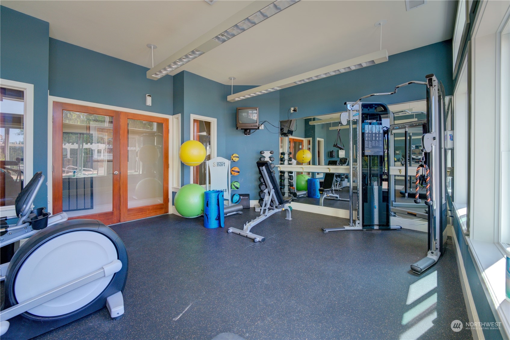 3908 243rd Place Southeast, Unit Q202 Bothell, WA 98021 - Photo 38 of 40 a view of a room with gym equipment
