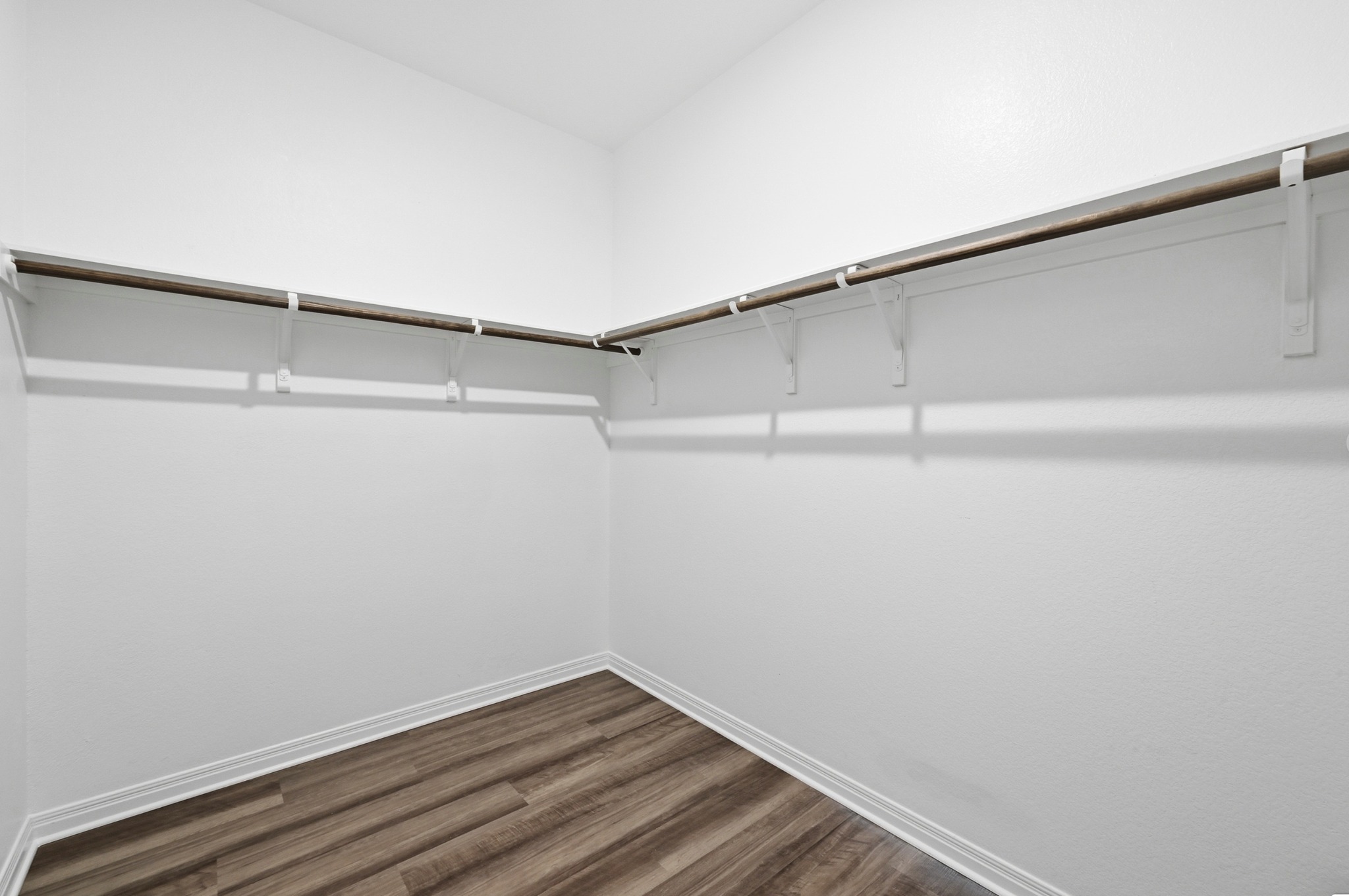 12606 Dairywork Road Buda, TX 78610 - Photo 19 of 32 a view of an empty walk in closet